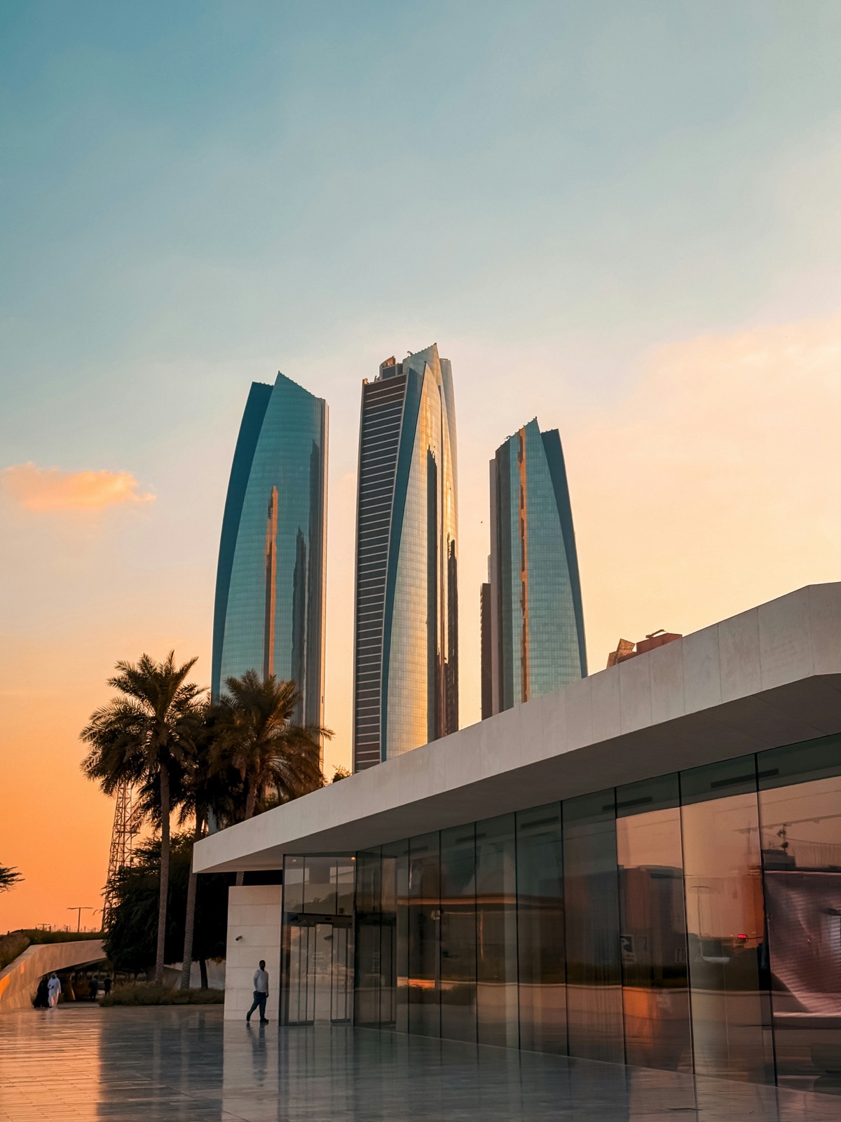 Abu Dhabi skyline and islands — investment guides for UK and international buyers
