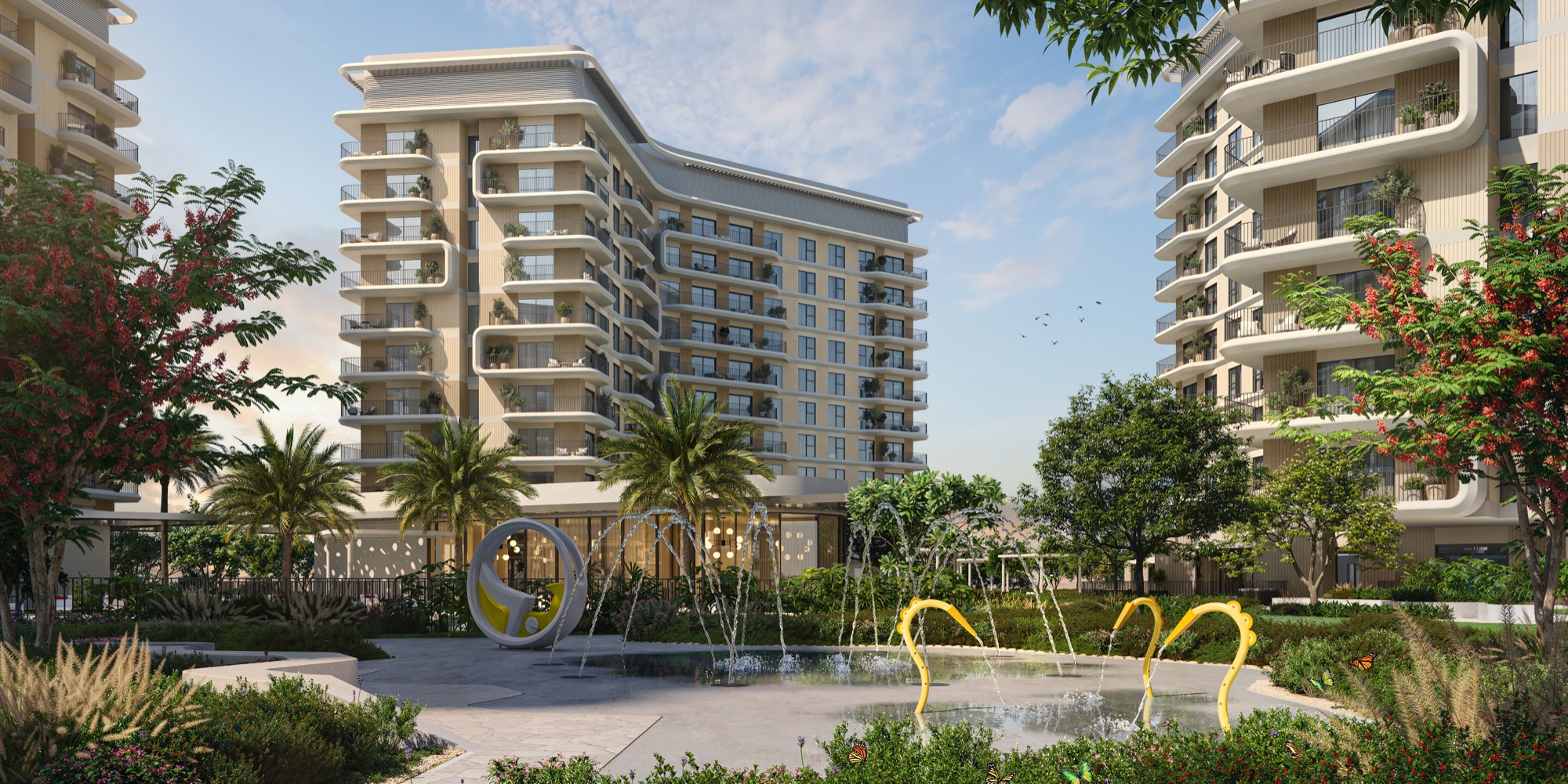 Yas Park Place Aldar Yas Island Abu Dhabi residential courtyard with kids' splash pad and architectural building backdrop