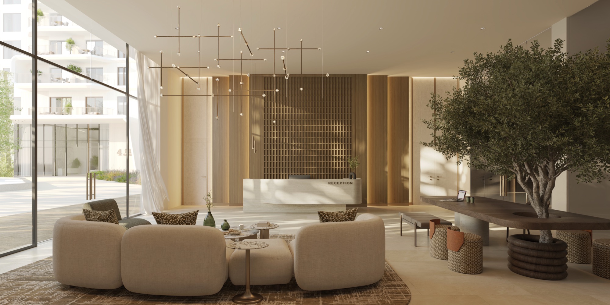 Yas Park Place Aldar Yas Island Abu Dhabi residents' co-working lounge with sculptural chandelier and reception desk