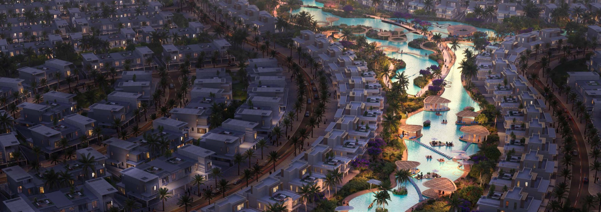 DAMAC Islands 2 Dubai aerial render at dusk — DAMAC tropical master community with lagoons, villas and townhouses
