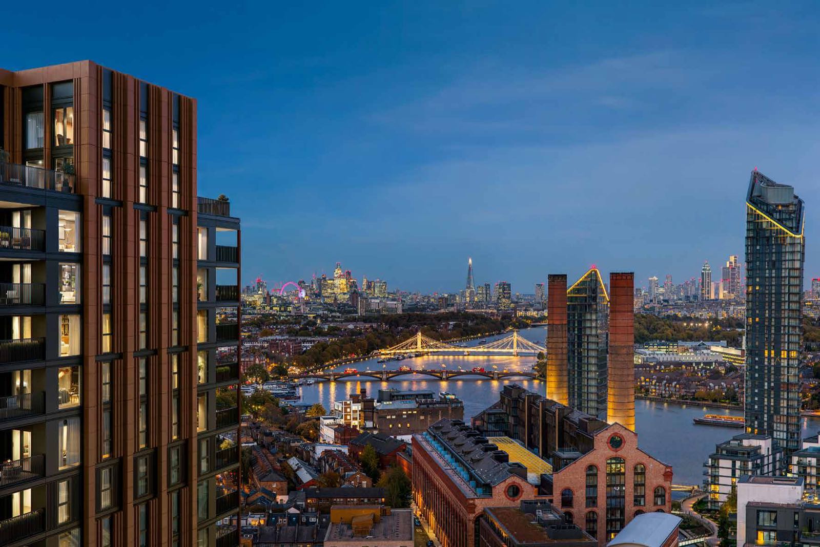 One King's Road Park Fulham SW6 London penthouse skyline view at dusk towards the City of London, the Shard and Battersea Power Station