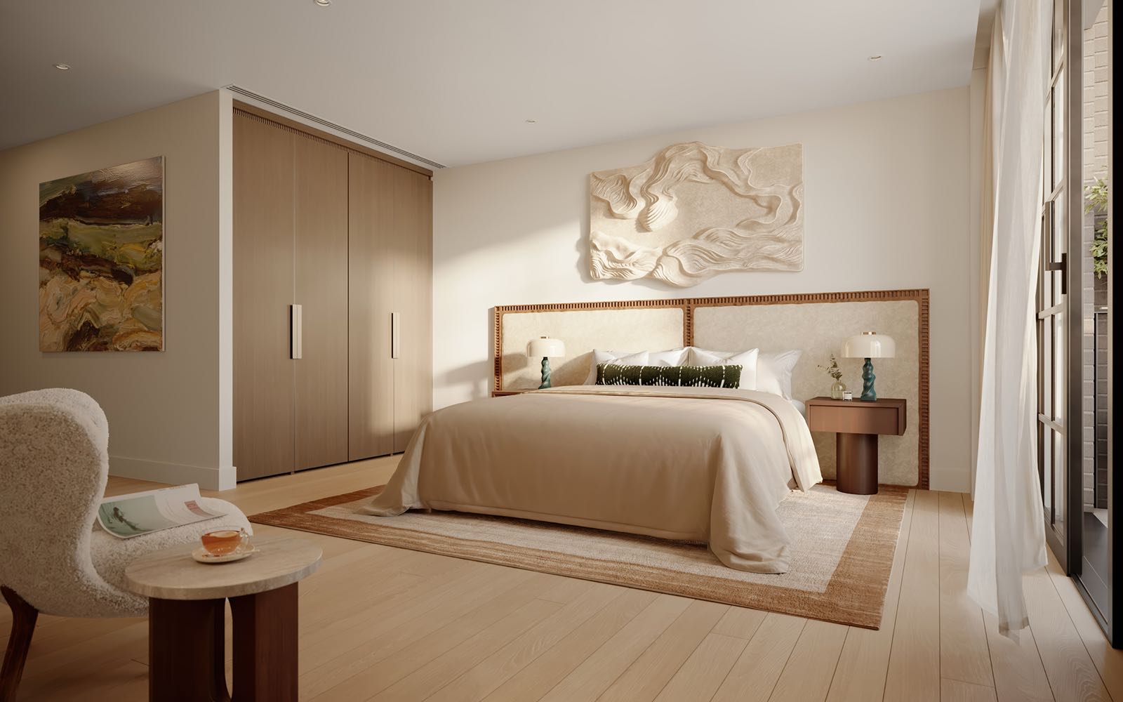 Ransome's Wharf Battersea SW11 London principal bedroom with oak-finish bespoke wardrobes and textile headboard