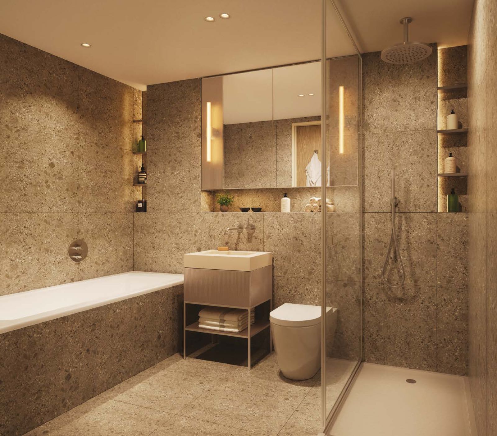 Trillium Paddington W2 London luxury bathroom with stone tiling, walk-in shower and brushed chrome fittings
