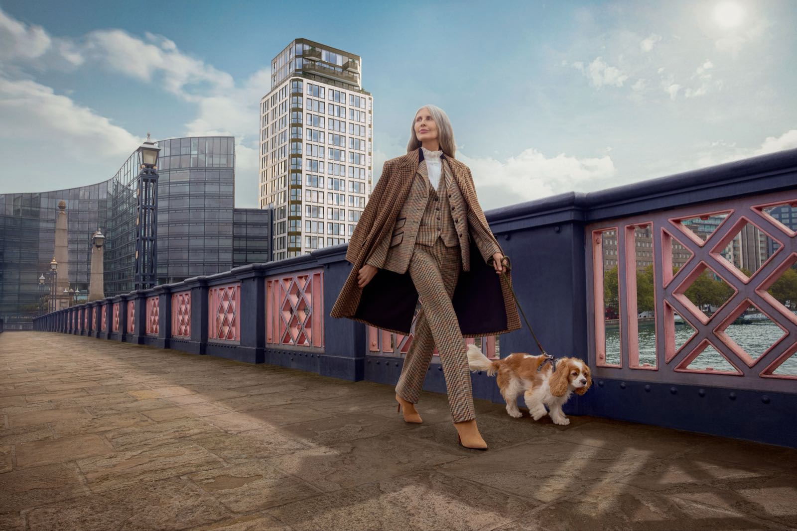 Westminster Tower SE1 Albert Embankment London tower viewed from Lambeth Bridge with Thames-side walker